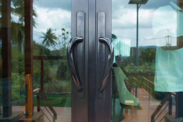 Modern black Metal door handle on glass door