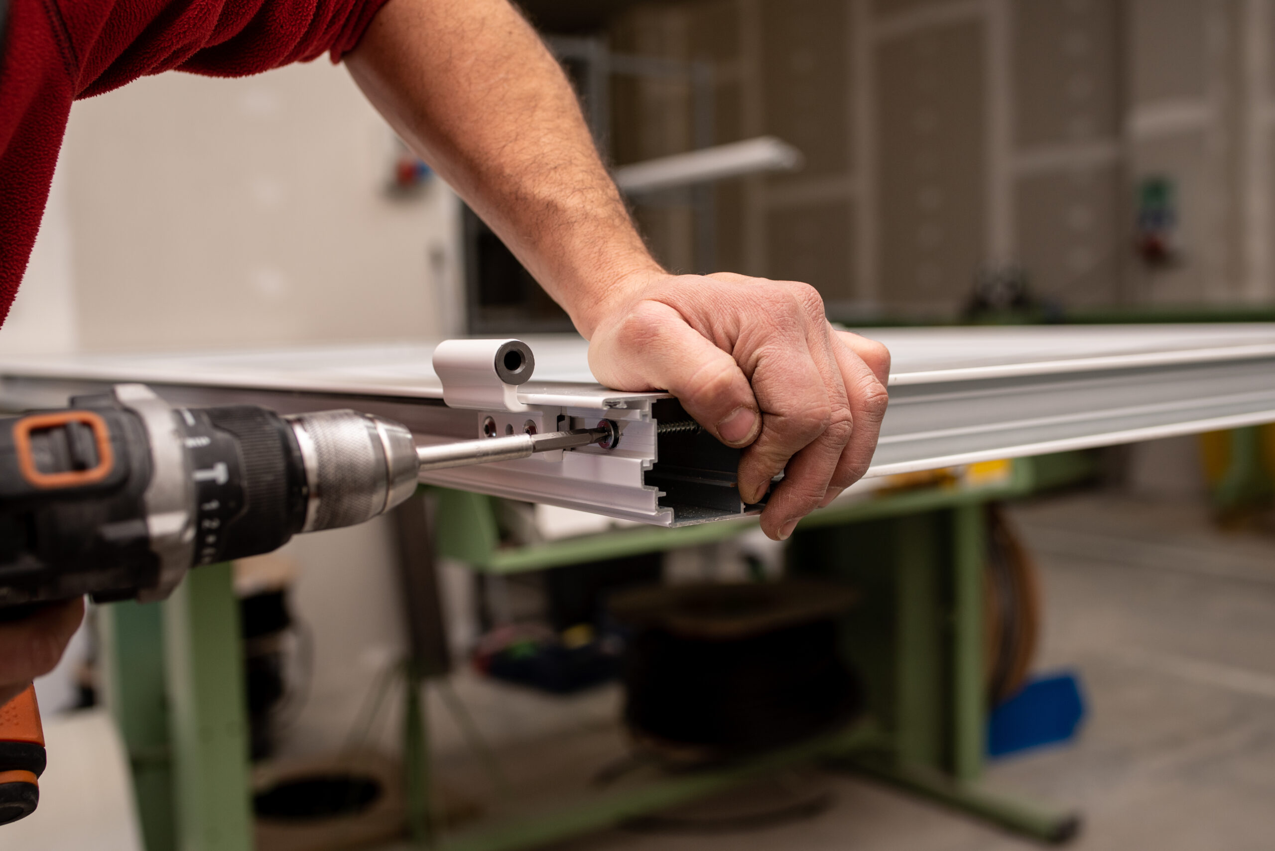 An image of a professional doing door repair services